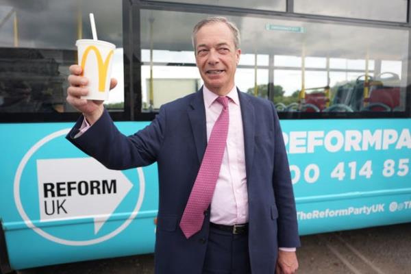 Woman charged with assault after milkshake thrown over Nigel Farage